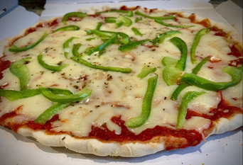 Partially baked pizza to cook at home